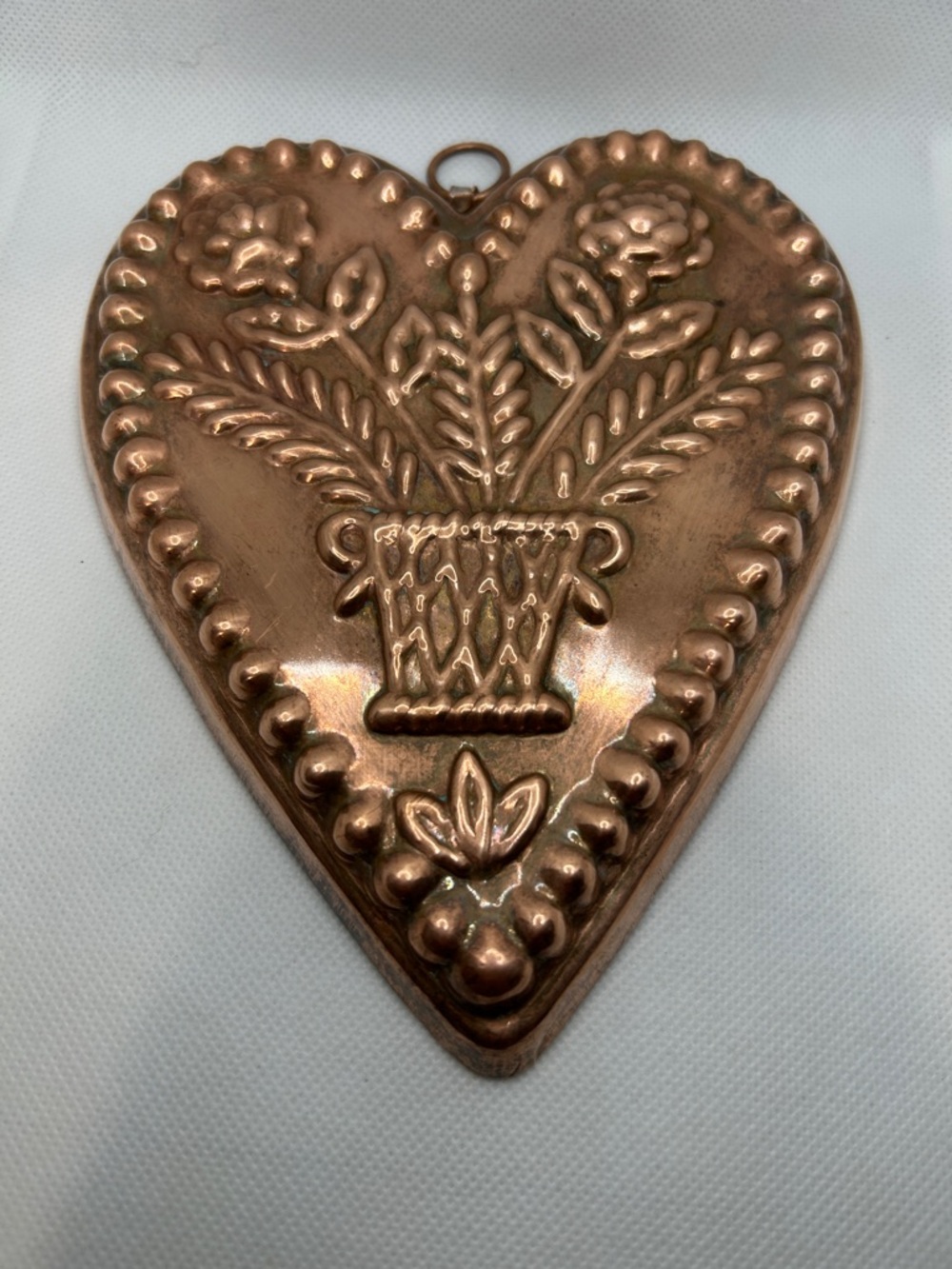 Heart-Shaped Copper Wall Hanging with Floral Motif